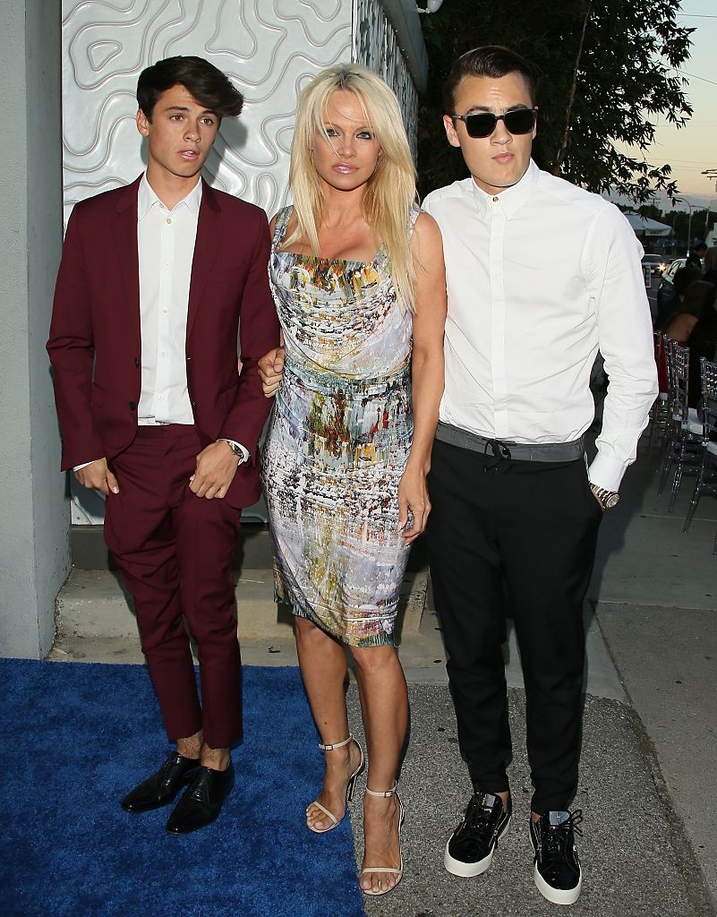 CULVER CITY, CA - AUGUST 29: (L-R) Dylan Jagger Lee, Pamela Anderson and Brandon Thomas Lee attend The Hidden Heroes Gala presented by Mercy For Animals at Unici Casa on August 29, 2015 in Culver City, California. (Photo by JB Lacroix/WireImage)